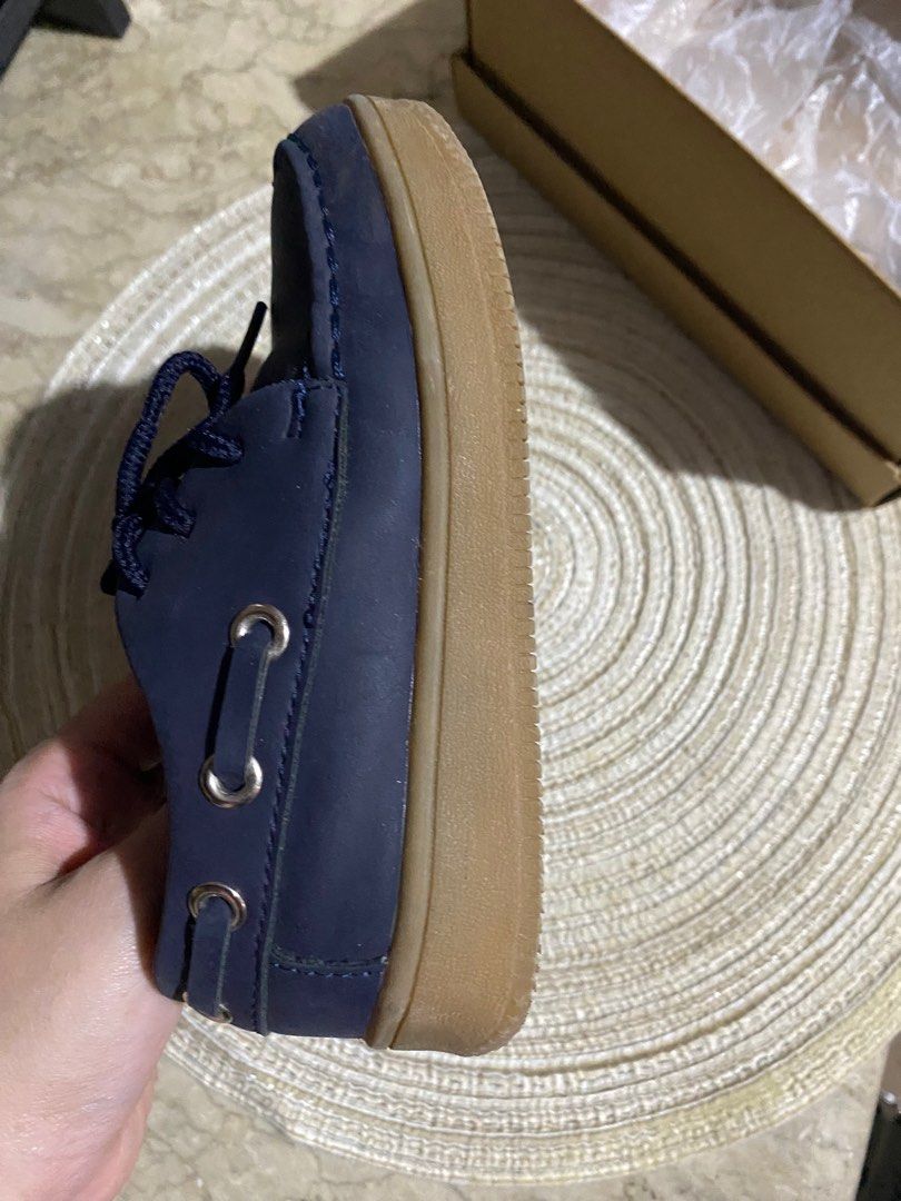 Boat Toddler Shoes - Navy Size 9 (Category: Babies & Kids Fashion) located in Bacoor. Submitted by chenggc (Listing ID 1407010962, Image 2). Description: - Toddler size 9 - Navy blue upper - Tan sole - Lace-up style - Includes original box - Box label: "Addie" style, "Navy" color - Step one Payless.