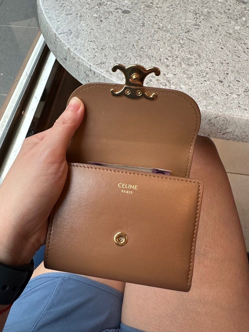 Celine small flap wallet triomphe (Category: Luxury Bags & Wallets) located in Taguig. Submitted by kyracarrillo (Listing ID 1407082788, Image 2). Description: RFS: Not my lucky color this year haha Bought from PH GREENBELT WITH BOX.