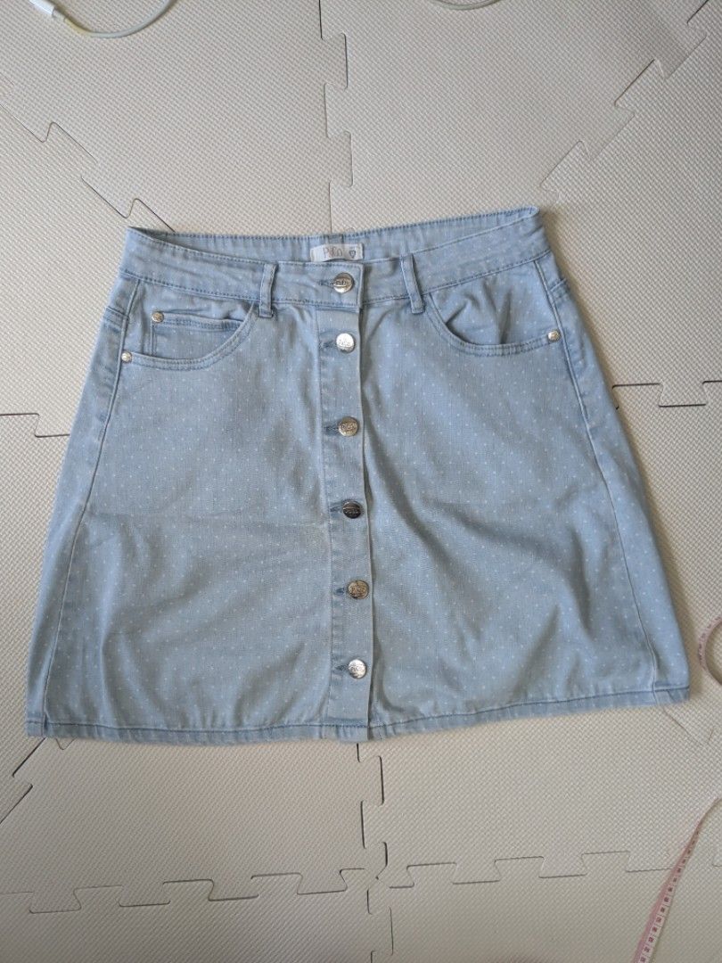 Dainty Polka Dot Light Wash Mini Skirt (Category: Skirts) located in Mandaluyong City. Submitted by coala32 (Listing ID 1407011532, Image 1). Description: - Light blue denim skirt - Polka dot pattern - A-line cut - Button closure - Two front and two back pockets - Waist: Approximately 14 inches - Stretchy fabric - Fits M best cute dainty skirt.