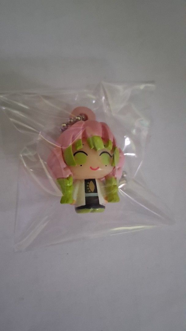 Demon Slayer Mitsuri Kanroji Keychains (Category: Character Goods) located in Aurora. Submitted by chi_thrifts (Listing ID 1407079278, Image 2). Description: - Demon Slayer: Mitsuri Kanroji Keychains - Includes: - acrylic keychain (₱50) - acrylic keychain (₱70) - Chibi figure keychain (₱150) - All keychains are new and sealed. - 250 if set CHECK MY PROFILE FOR MORE ANIME MERCH GCASH/SPX.