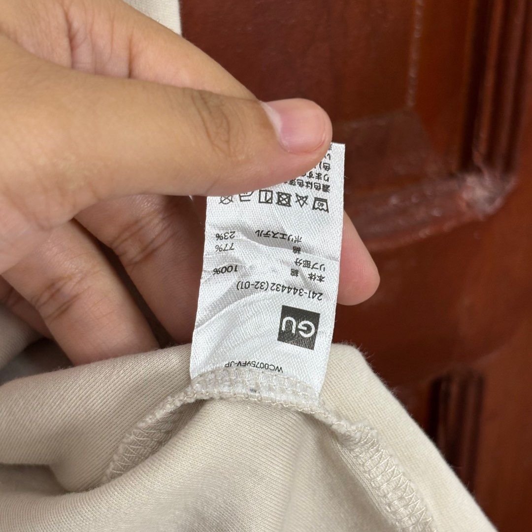 GU Mock Neck T-shirt - Beige (Category: Shirts) located in Malilipot. Submitted by brevsthrift (Listing ID 1407177359, Image 3). Description: - GU beige mock neck t-shirt - Size: L (W19 L23) - Short-sleeved - Material: Polyester/Cotton blend - Style: Minimalist - Comfortable and soft fabric - Ideal for everyday use - Excellent condition Plus sf.