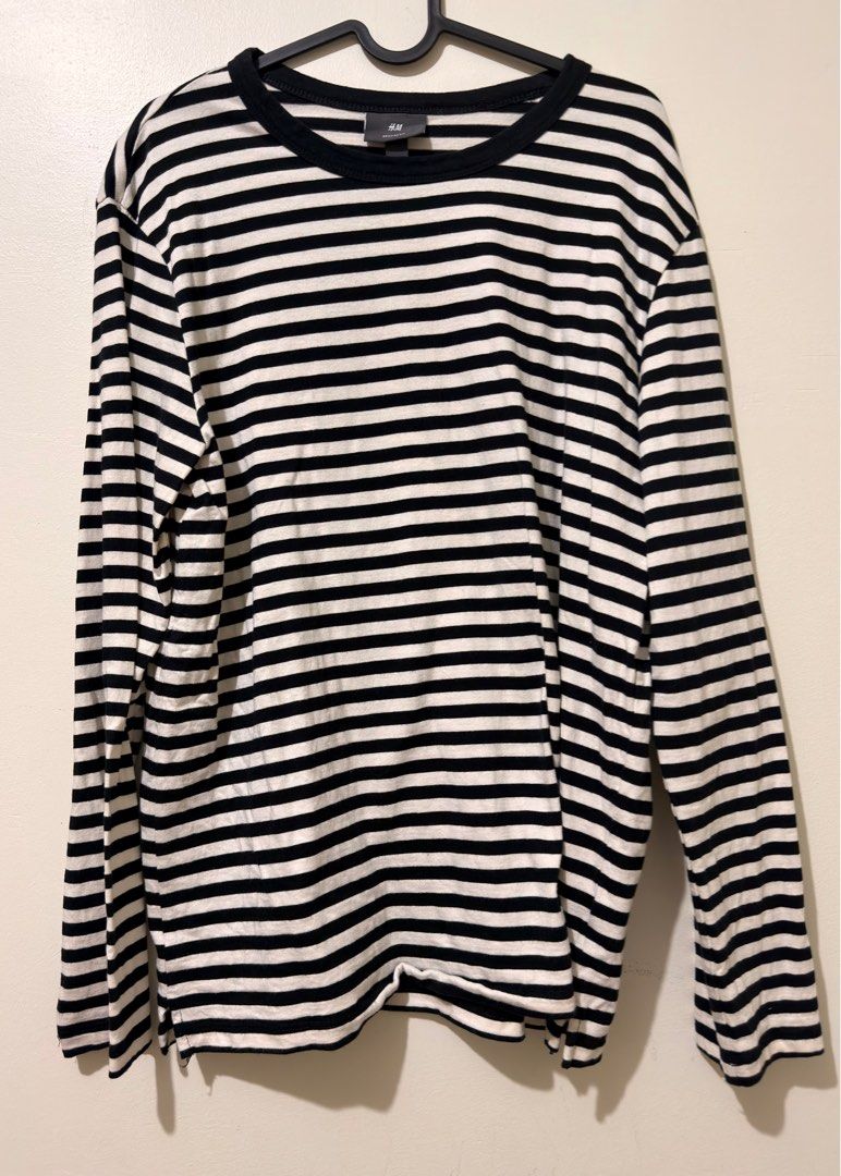 H&M Striped Long Sleeve Shirt (Category: Longsleeves) located in Quezon City. Submitted by declutterw_v (Listing ID 1407163281, Image 1). Description: - H&M long sleeve shirt - Black and white stripes - Crew neck - Regular fit - Size L - Comfortable fabric.