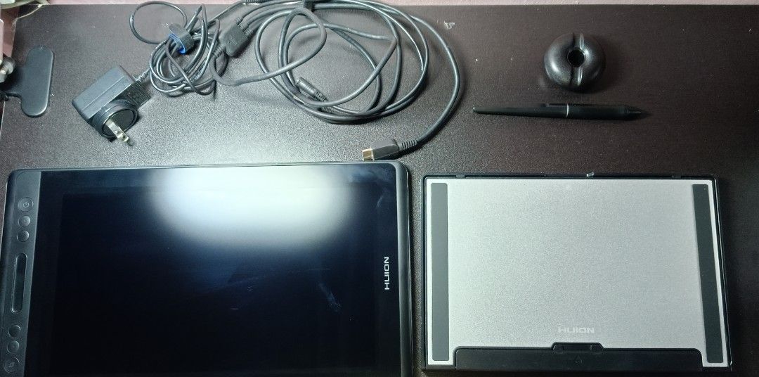 Huion Kamvas 13 Pro (FINAL PRICE) (Category: Others) located in Manila. Submitted by jinx_coyle (Listing ID 1407071754, Image 1). Description: INCLUDES: 13.3 inch tablet with minor scratches, pen, extra nibs, stand, and 3 in 1 cable, stand with faint long scratch. PRICE: Price stated in the listing is the lowest I can go po PAYMENT: Gcash only DELIVERY: Lalamove only FLAWS: Small tiny dead pixel in the middle (can show video of working tablet upo