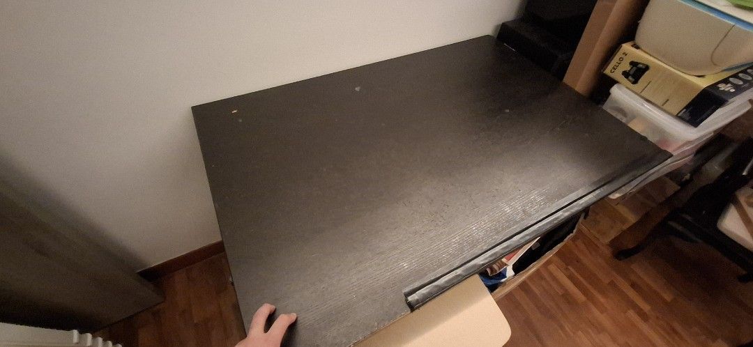 Ikea Study table - Adjustable height & angle (Category: Tables & Sets) located in Singapore. Submitted by justin_db (Listing ID 1407140639, Image 3). Description: Ikea study table 1.2m x 0.8m. Variable angle and height (not automated). Very well used but still a great table, plenty of space for working and storing some of your stuff. Let me know if you have any questions and I'll answer what I can. Currently assembled but can be disassembled for 