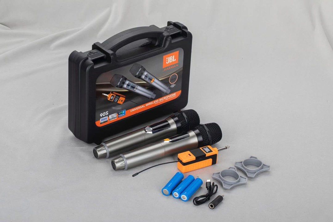 JBL 90S Universal Wireless Microphone (Category: Microphones) located in Manila. Submitted by adrianepad88570 (Listing ID 1407057959, Image 1). Description: - JBL 90S Wireless Microphone Set - Includes two microphones - Receiver included - Comes with batteries and charging cable - Features microphone holders - Each microphone has an LCD screen - DC-5V charging port on each microphone - Packaged in a convenient carrying case.