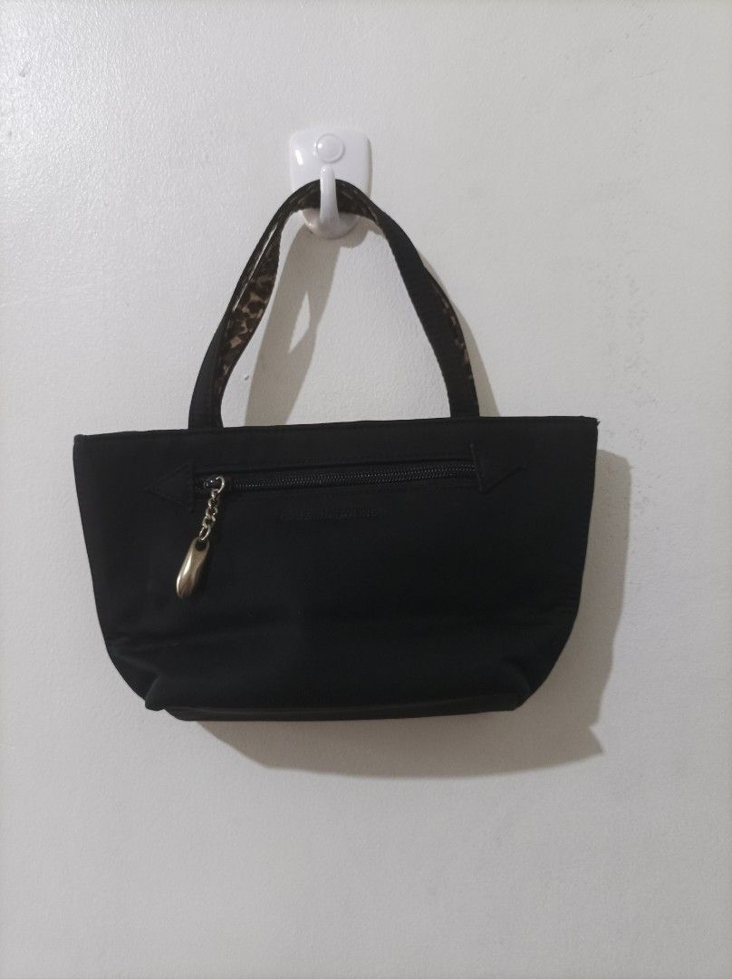Liz Claiborne Mini Tote Black Handbag (Category: Purses & Pouches) located in Quezon City. Submitted by 90sradar (Listing ID 1407081068, Image 1). Description: black and animal print polyester material hidden magnetic closure 2 zipper compartments width - 9" height -5" depth -3".