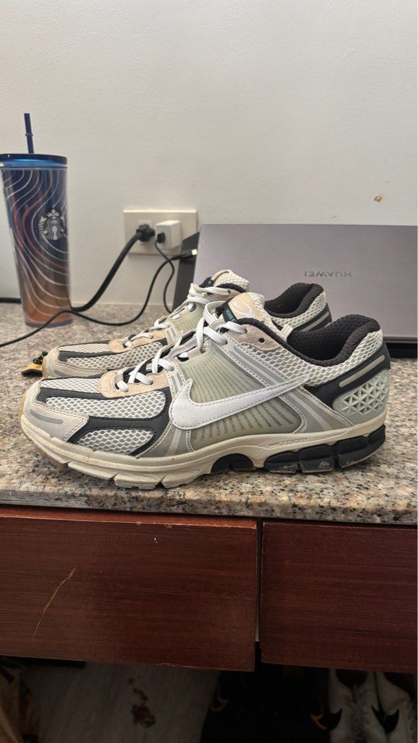 Nike Zoom Vomero 5 Supersonic (Category: Sneakers) located in Marikina City. Submitted by nlsf14 (Listing ID 1407005825, Image 1). Description: - Nike Zoom Vomero 5 - Color: White and Grey - Size: US 9.5 - Mesh upper with leather overlays - Nike swoosh detail - Black and grey sole - White laces.