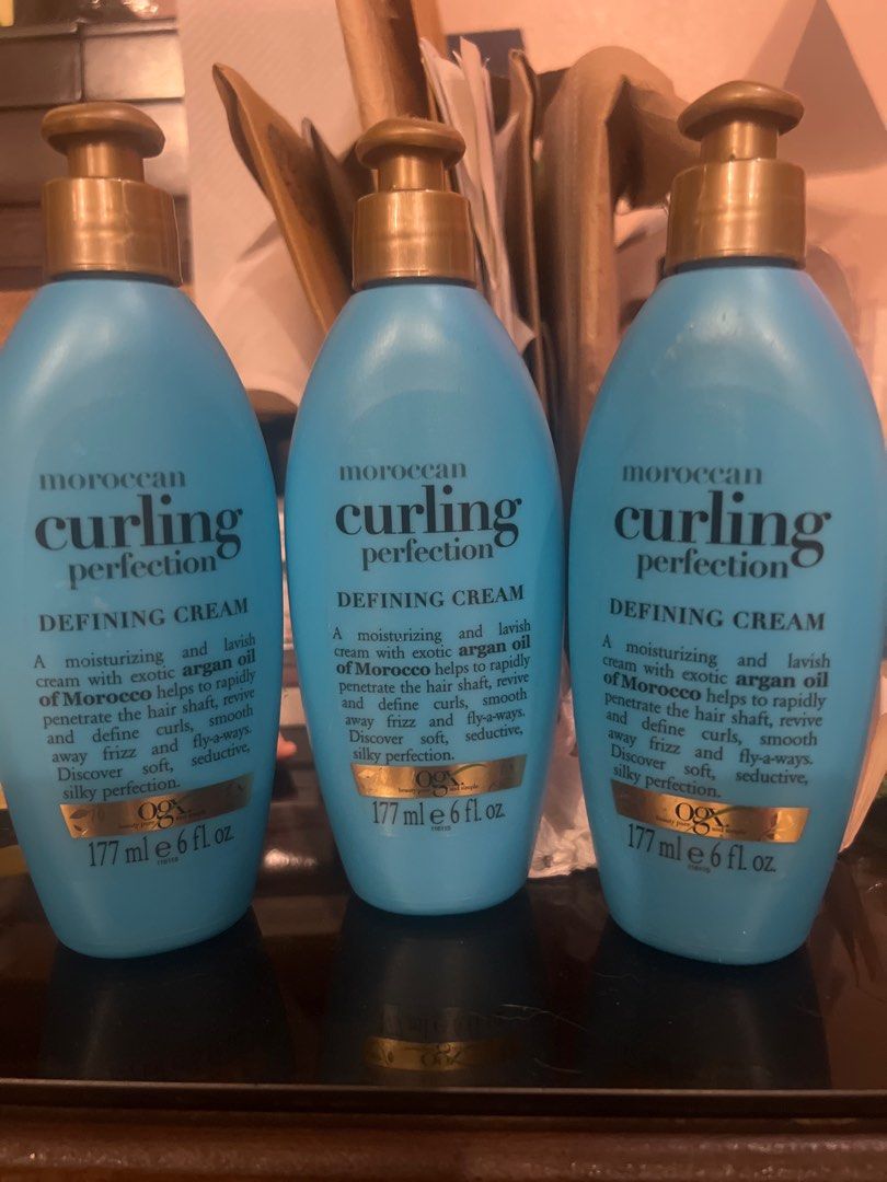 OGX Moroccan Curling Perfection Defining Cream (Category: Hair) located in Makati City. Submitted by sneakymom (Listing ID 1407139489, Image 1). Description: - OGX Moroccan Curling Perfection Defining Cream - Infused with exotic Moroccan argan oil - Defines and revives curls - Smooths frizz and flyaways - Leaves hair soft and silky *From the US *My sister bought too much.