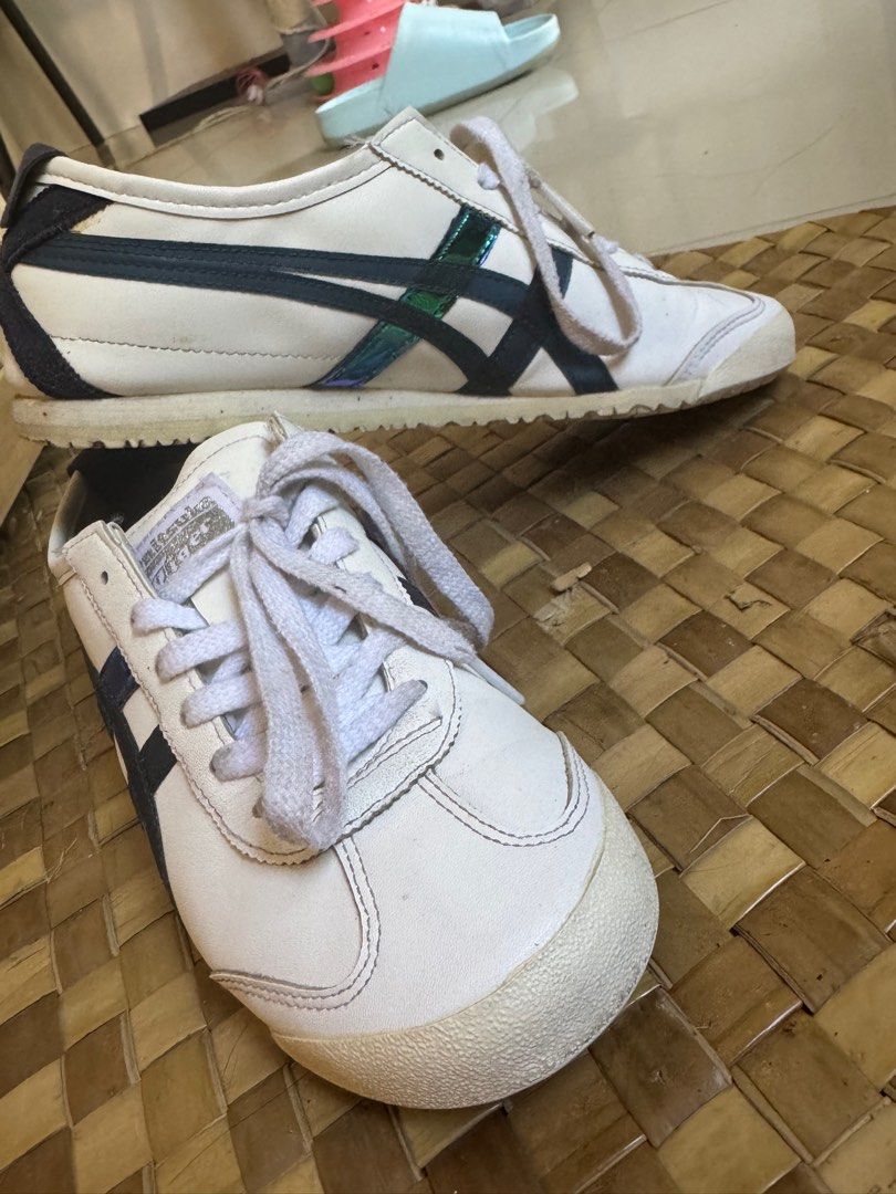 Onitsuka Tiger Mexico 66 Sneakers (Category: Sneakers) located in Angeles City. Submitted by mityi10s (Listing ID 1407041860, Image 2). Description: Onitsuka Tiger Mexico 66 (white/navy) Used pair with signs of wear but no major defects; soles still intact and very comfy for everyday casual outfits. Letting go for ₱1499 negotiable.