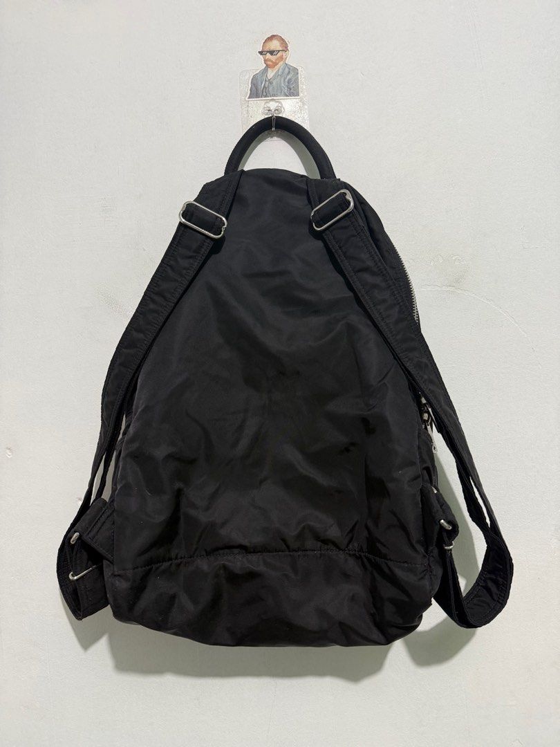 Porter Black Backpack (Category: Backpacks) located in Sorsogon. Submitted by jovert_23alviz (Listing ID 1407157162, Image 2). Description: - Black Porter backpack - Front pocket - Top handle - Adjustable shoulder straps - Main compartment with orange lining - Zipper closure - Interior Porter tag - Front logo - Made of nylon.