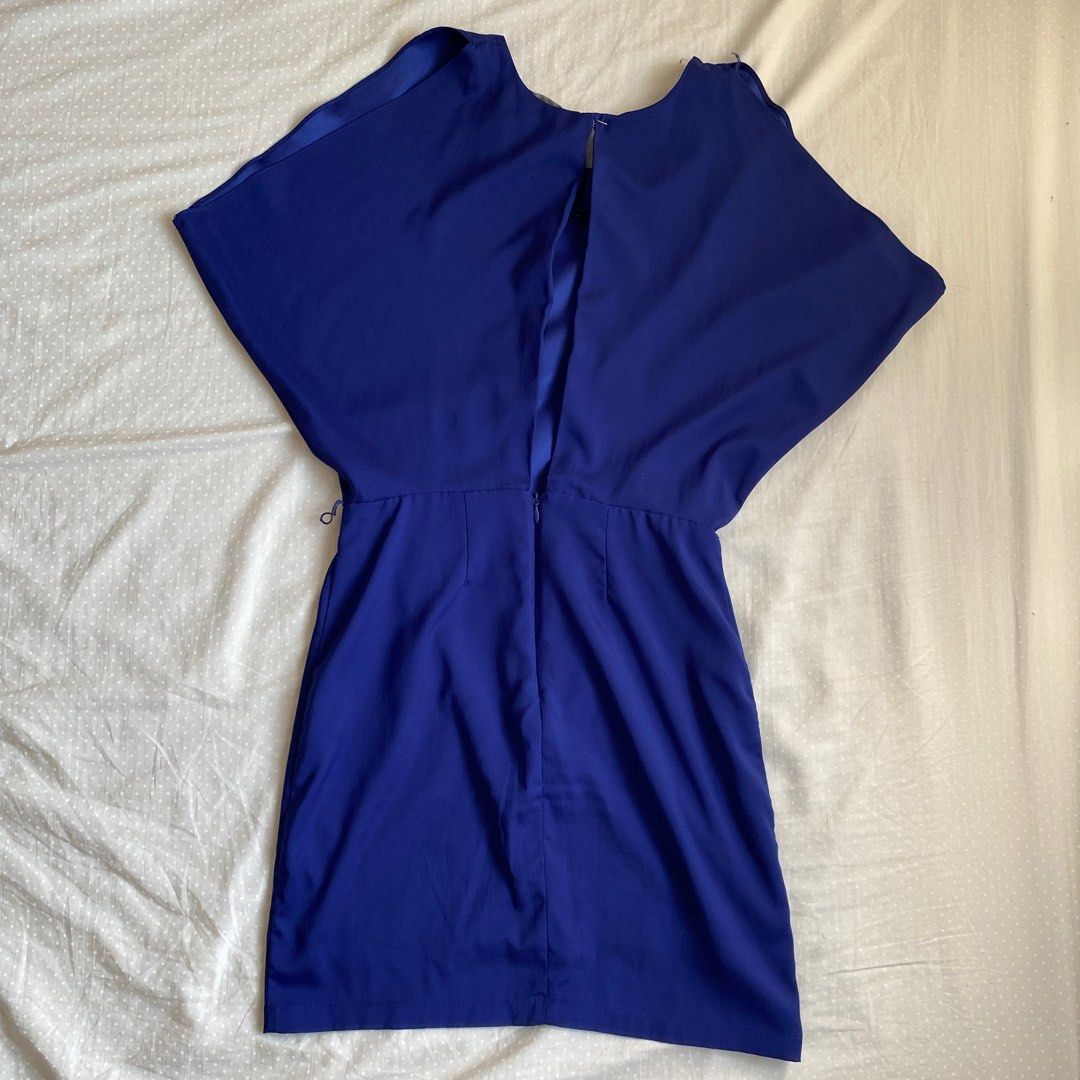 Smartset Blue Dress (Category: Dresses) located in Muntinlupa City. Submitted by fika_thriftshop (Listing ID 1407108059, Image 3). Description: -Can fit XS to M frames comfortably. -Flaws include: missing clasp lock at the top of the neck (replaced temporarily with gold safety pin), some pilling on the inside of the neck but nothing crazy as it can be removed without damaging the inner fabric, a tiny tiny hole on the 2nd to the last photo. -Open 
