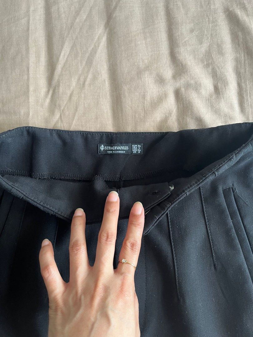 Stradivarius Black Trousers (Category: Other Bottoms) located in Makati City. Submitted by joylemjnd (Listing ID 1407133283, Image 2). Description: Stradivarius black trousers. High-waisted, straight leg, and side pockets. Size EUR 34, USA 2, MEX 24. Solid black..