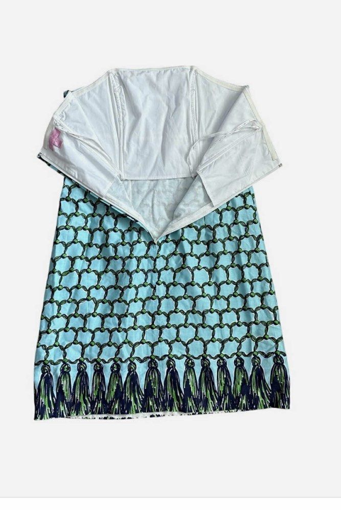 Strapless Tassel Print Dress (Category: Dresses) located in Cebu City. Submitted by declutter_ysh (Listing ID 1407065605, Image 3). Description: Strapless dress with unique print and tassel hem. Light blue with green and navy accents. Lightweight fabric, perfect for warm weather. Zipper closure..