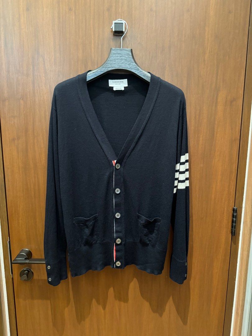 Thom Browne cardigan blue (Category: Luxury Apparel) located in San Juan City. Submitted by mistali_ (Listing ID 1407041348, Image 1). Description: Size 4 Srp 75k Bought in tokyo Blue Buttons complete no issue Rfs: got fat .