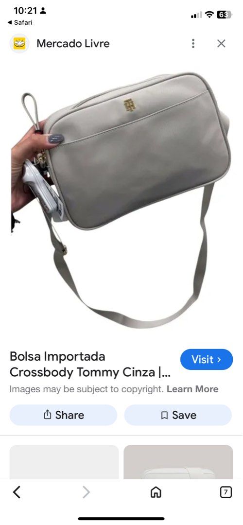 Tommy Hilfiger Crossbody Bag (Category: Cross-body Bags) located in Manila. Submitted by peacd (Listing ID 1407011314, Image 2). Description: - Tommy Hilfiger crossbody bag - Neutral grey color - Patterned strap - Gold-tone logo and hardware - Rectangular shape - Smooth material - Detachable strap.