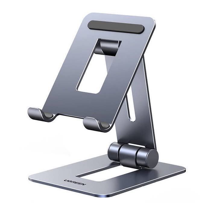 UGreen Adjustable & Foldable Desktop Phone Stand (Category: Mounts & Holders) located in Makati City. Submitted by jc.cuerdo (Listing ID 1407179155, Image 3). Description: UGreen Adjustable & Foldable Desktop Phone Stand UGREEN LP678 folding stand for phone Bet on comfort during your daily activities with phone! UGREEN LP678 is a practical stand with customizable angle. Designed for phone and tablets up to 7.9’’ it guarantees wymaganą stability i