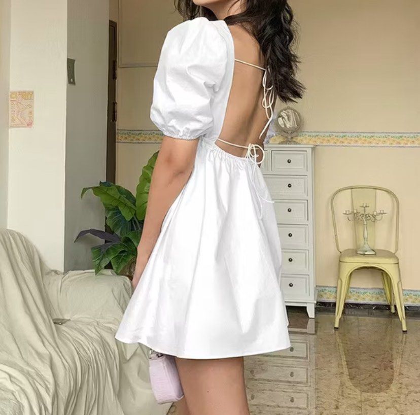 White Puff Sleeve Backless Dress (Category: Dresses) located in Navotas City. Submitted by PATTY (Listing ID 1407182589, Image 2). Description: Used Once! Freesize Mop: Gcash Mod: GGX, Flash Express, Lalamove, LBC.