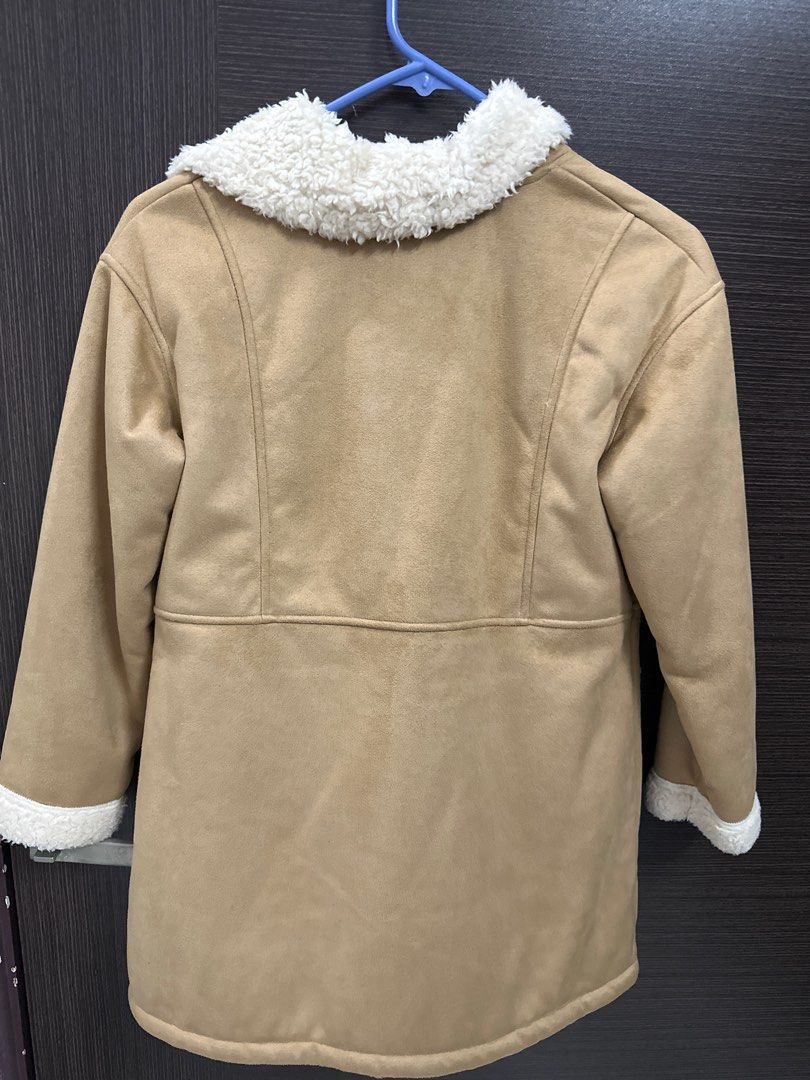 winter jacket (Category: Babies & Kids Fashion) located in Singapore. Submitted by jpkp (Listing ID 1407066512, Image 2). Description: Uniqlo kids coat 140cm only worn once or twice selling for $15 dm for measurements! .