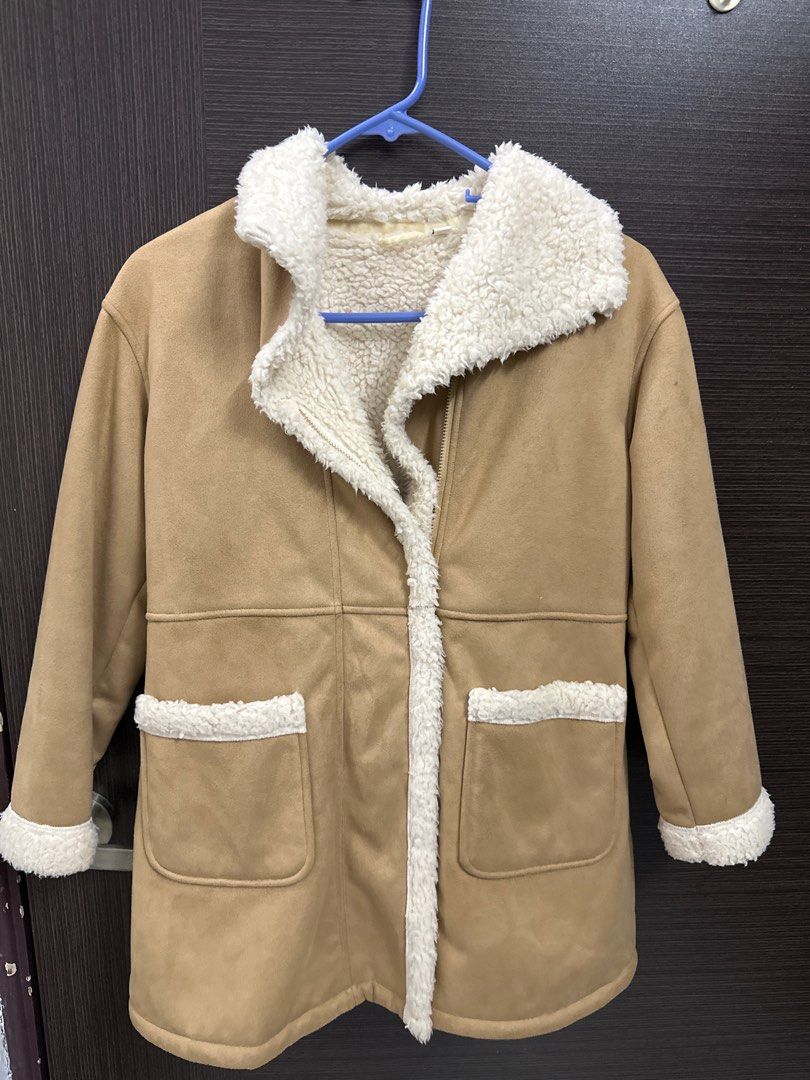 winter jacket (Category: Babies & Kids Fashion) located in Singapore. Submitted by jpkp (Listing ID 1407066512, Image 1). Description: Uniqlo kids coat 140cm only worn once or twice selling for $15 dm for measurements! .