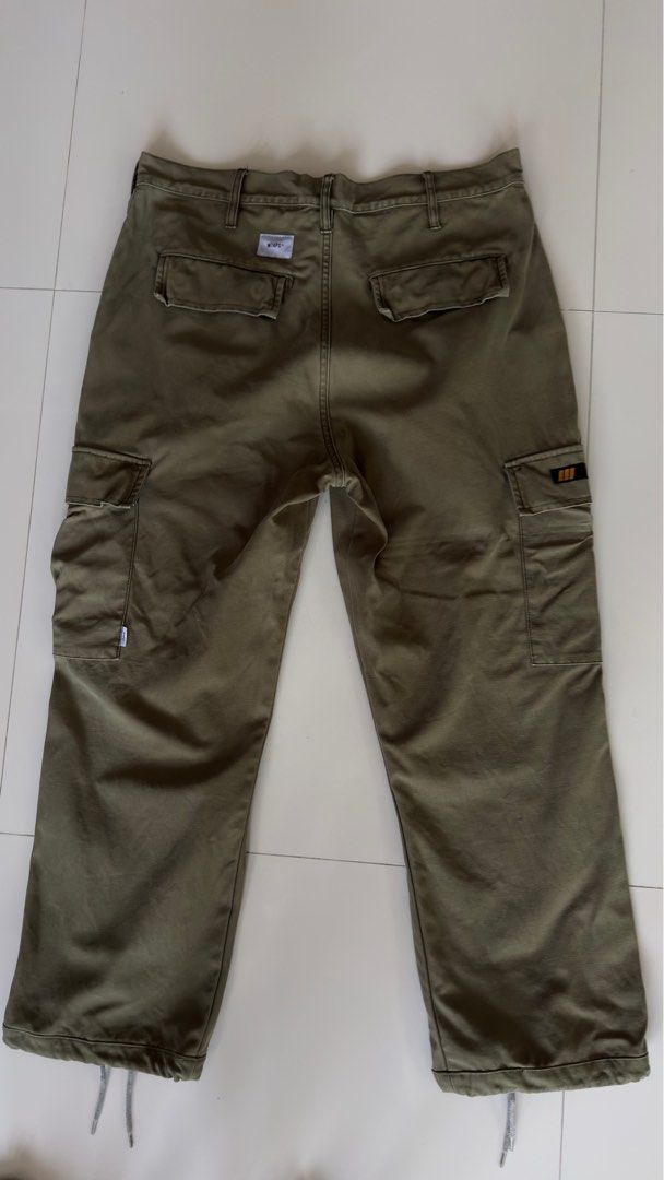 WTAPS Cargo Pants Olive Green (Category: Trousers) located in San Pedro. Submitted by chestert121021 (Listing ID 1407019812, Image 2). Description: Wtaps Olive Cargo Pants Dimension: Size on tag 03 Waist 18inch Inseam 26inch Outseam 38inch Leg opening 9inch adjustable Rfs: Declutterring.