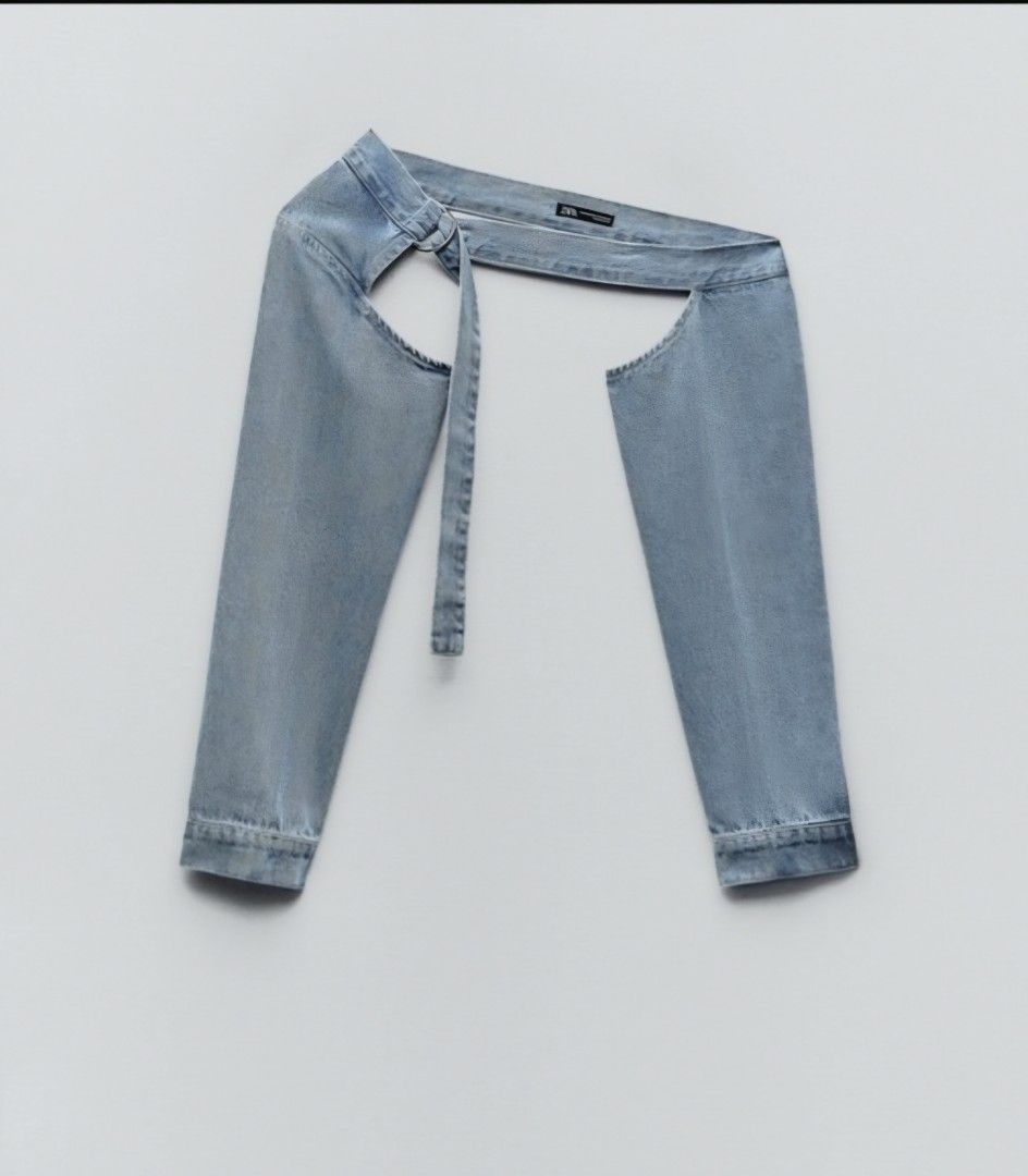 Zara Denim Asymmetric sleeves (Category: Coats, Jackets and Outerwear) located in Quezon City. Submitted by bk2025 (Listing ID 1407178724, Image 2). Description: - Zara denim bolero - Light blue wash - Size: M-L - adjustable closure with metal buckle .