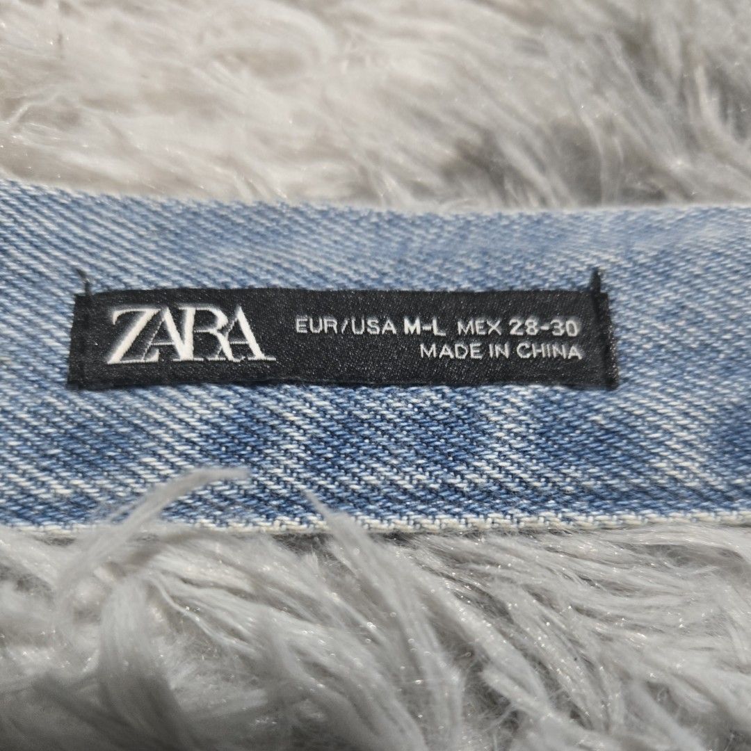 Zara Denim Asymmetric sleeves (Category: Coats, Jackets and Outerwear) located in Quezon City. Submitted by bk2025 (Listing ID 1407178724, Image 3). Description: - Zara denim bolero - Light blue wash - Size: M-L - adjustable closure with metal buckle .