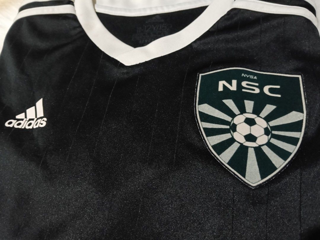 Adidas NSC Jersey - Size 12Y/152 (Category: Babies & Kids Fashion) located in Taguig. Submitted by peterjohn088557 (Listing ID 1402100209, Image 2). Description: - Adidas jersey with white accents - Features the NSC logo on the chest - Number 50 on the back - Adidas logo on the front - Size: 12Y/152 - Made in Cambodia - Aeroready material.