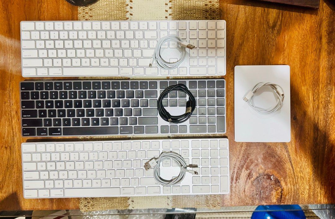 Apple Magic Keyboard & Apple Trackpad (Category: Computer Keyboard) located in Makati City. Submitted by closet2closetii (Listing ID 1402272349, Image 1). Description: Apple magic Keyboard with numeric key (with lightning cable included) x 3pcs ✅almost new condition, all keys working, no dead characters ✅ charging cord included. No box Apple Trackpad 2 (with lightning cable included) x1 pc ✅almost new condition, all keys working, no dead characte