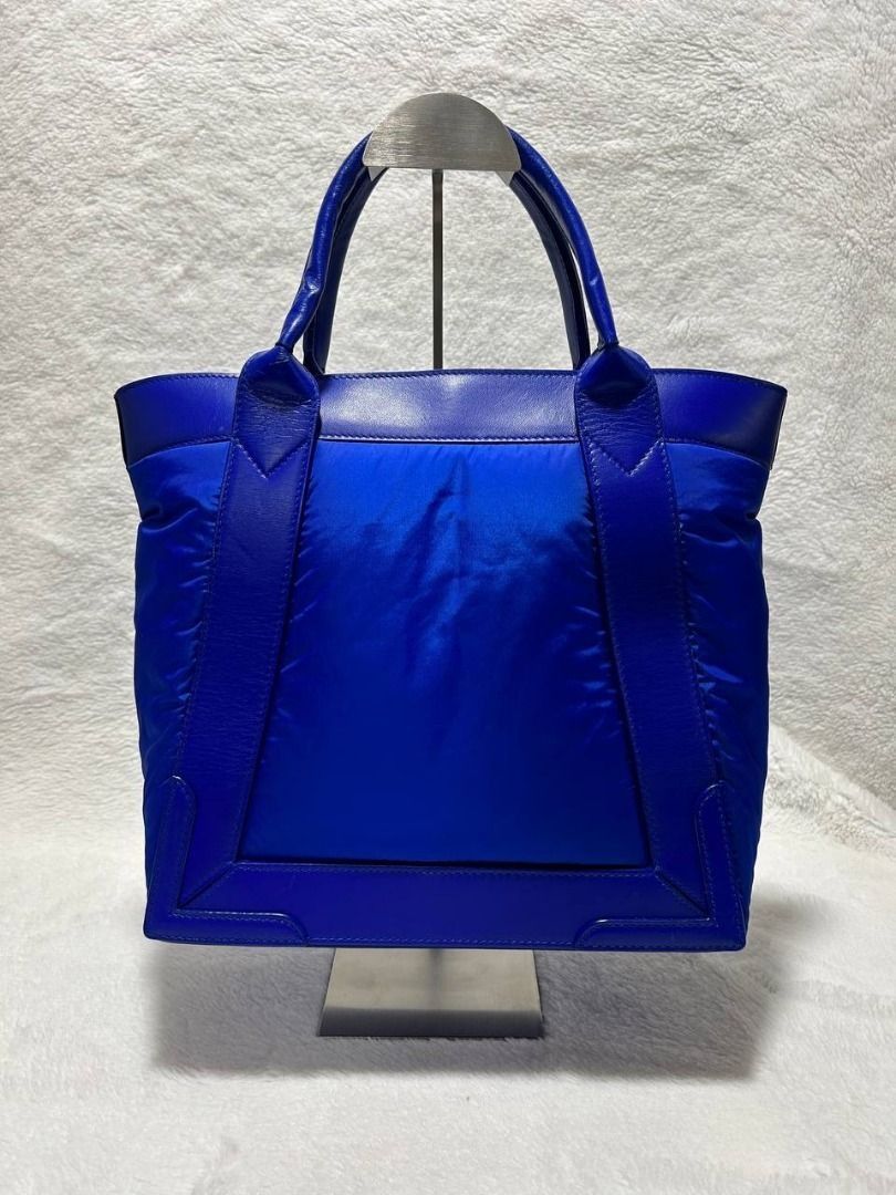 Authentic Balenciaga Cabas S Tote Bag (Category: Luxury Bags & Wallets) located in Manila. Submitted by jeanskiecloset (Listing ID 1402287513, Image 2). Description: 100% Authentic Balenciaga Cabas S Tote Bag Preloved Navy Cabas S Material: Nylon leather SIZE AND FIT 11.5"W x 11"H x 5.5"D 4.5" handle drop.