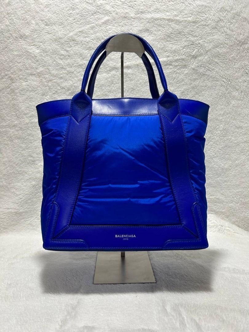 Authentic Balenciaga Cabas S Tote Bag (Category: Luxury Bags & Wallets) located in Manila. Submitted by jeanskiecloset (Listing ID 1402287513, Image 1). Description: 100% Authentic Balenciaga Cabas S Tote Bag Preloved Navy Cabas S Material: Nylon leather SIZE AND FIT 11.5"W x 11"H x 5.5"D 4.5" handle drop.