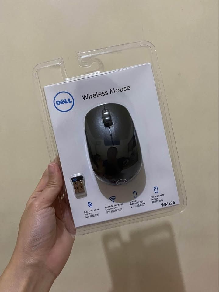 Dell Wireless Mouse WM126 (Category: Mouse & Mousepads) located in Caloocan City. Submitted by miagozon (Listing ID 1402190768, Image 1). Description: - Dell Wireless Mouse WM126 - Includes mouse and USB receiver - Universal connectivity - Comfortable design - Color: Black - Uses 1 AA battery - Package includes: Mouse and receiver.