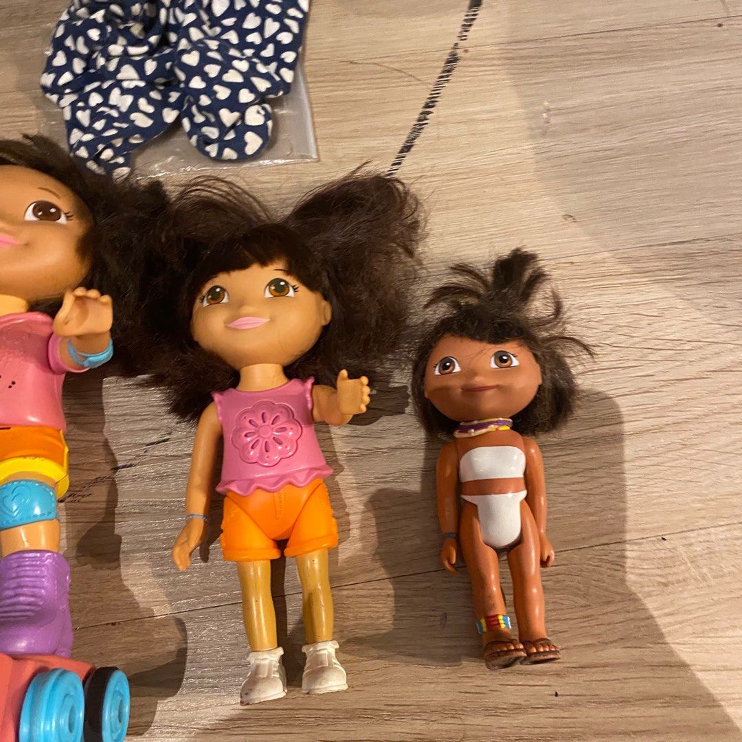 Dora the Explorer Dolls (Category: Kids Toys) located in Pasay City. Submitted by tindarela (Listing ID 1402153494, Image 3). Description: - Dora the Explorer doll collection. - Includes Dora dolls in various outfits. - Some dolls come with accessories. - Perfect for playtime or collecting. - Great for kids who love Dora the Explorer. For take all na po what you see is what you get.