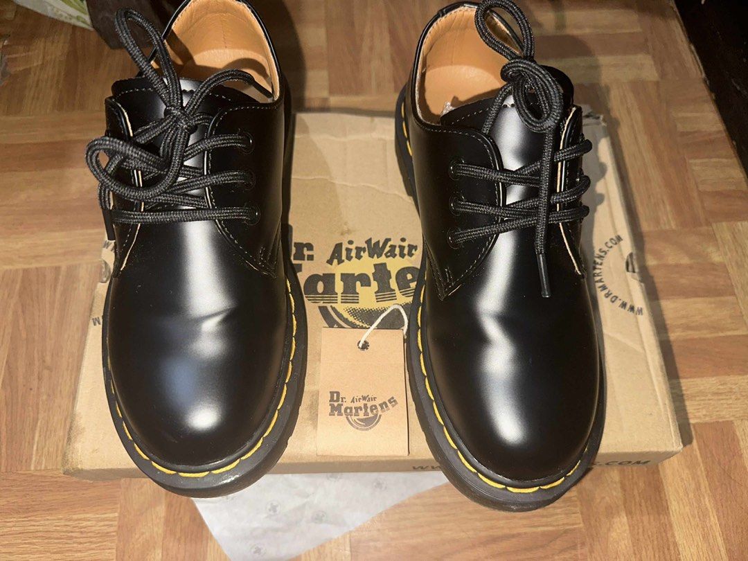 Dr. Martens 1461 Black Shoes (Category: Loafers) located in Pasig City. Submitted by loreyyn (Listing ID 1402189902, Image 1). Description: - Classic Dr. Martens 1461 in black - Iconic yellow stitching - Durable sole - Includes original box and tags - Size: UK 6, EUR 36, US 4 - Made with AW501 material.