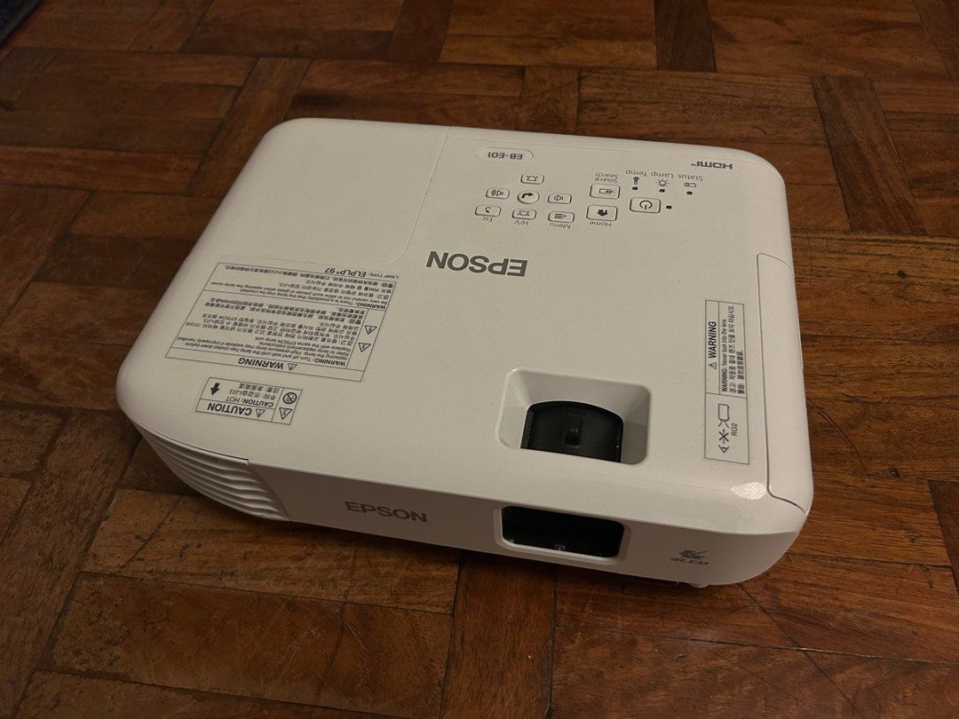 Sale/Swap: Epson EB-E01 Multimedia Projector (Category: Projectors) located in Taguig. Submitted by mikaelwakin (Listing ID 1402205224, Image 1). Description: With box With remote control With HDMI With manual book and cd RFS: declutter Dm .