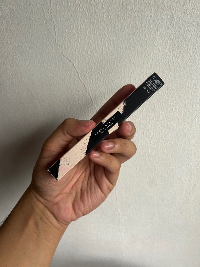 Fenty Beauty by Rihanna Flyliner (Category: Makeup) located in Mandaluyong City. Submitted by quainvanity (Listing ID 1402174890, Image 1). Description: - Fenty Beauty by Rihanna Flyliner - New and unused - Liquid eyeliner - Original packaging - Black packaging with brand and product details.