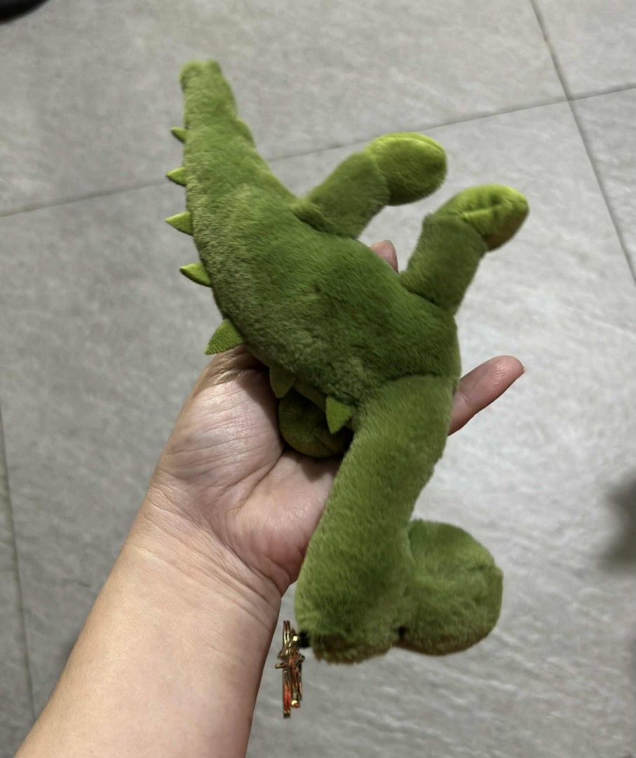Green Dinosaur Keychain Plush (Category: Plushies & Soft Toys) located in Manila. Submitted by dallecloset_ii (Listing ID 1402146323, Image 2). Description: Cute green dinosaur plush keychain! Soft and cuddly, approx. Perfect for keys, bags, or backpacks. .