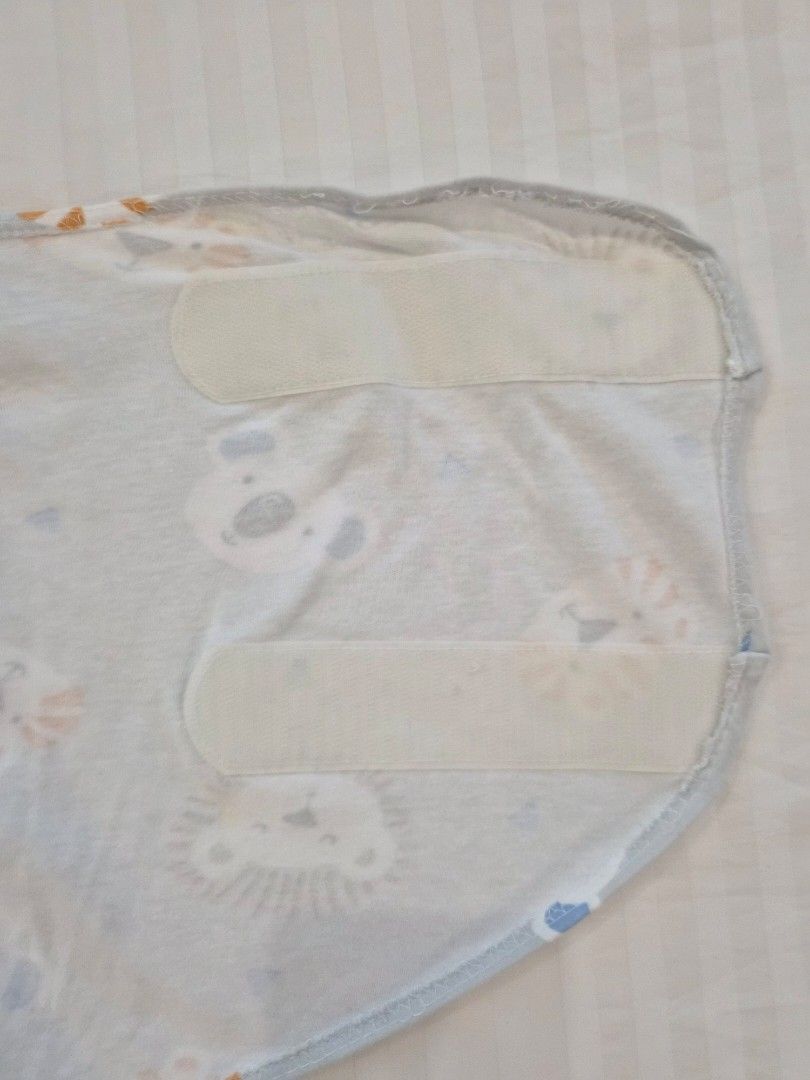HALO Multiway Swaddle (Category: Babies & Kids Fashion) located in Quezon City. Submitted by stmcc (Listing ID 1402184822, Image 2). Description: Php 1000 each Take 3 for 2500 Original HALO swaddle Washed but never used. RFS: My second born does not want to be swaddled. Payment: Gcash Can do meet up around Timog area. Can also do courier. Courier shouldered by buyer..