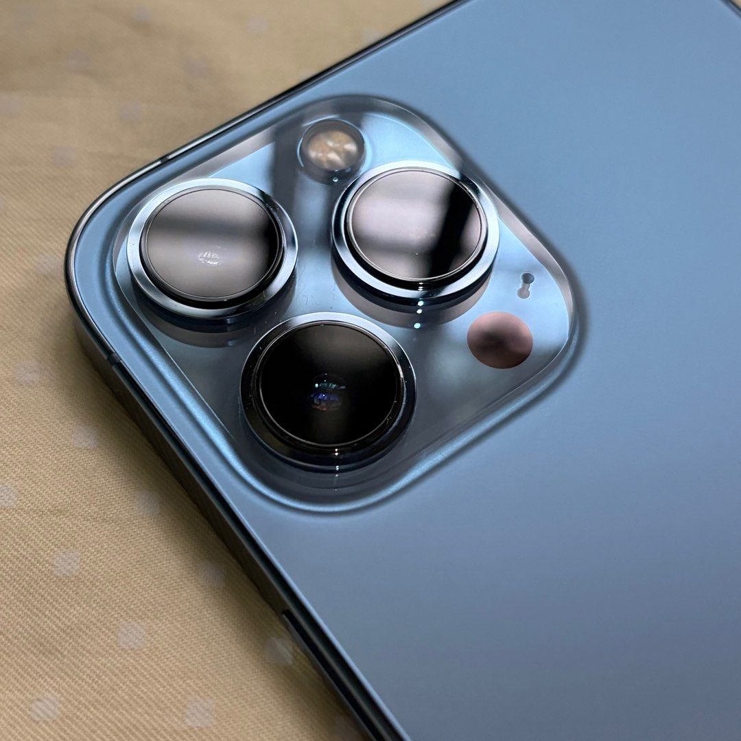 iPhone 13 Pro Max 128 GB Sierra Blue (Used) (Category: iPhone 13 Series) located in Las Pinas. Submitted by fullyclothed (Listing ID 1402151565, Image 3). Description: For Sale: iPhone 13 Pro Max Color: Sierra Blue Storage: 128 GB Condition: Well-used, all original parts (no replacements), no repairs done Openline Battery: 81% Aesthetic: Minor flaws on the sides Functionality: Camera and speakers working perfectly, no iCloud / face ID issue No ca