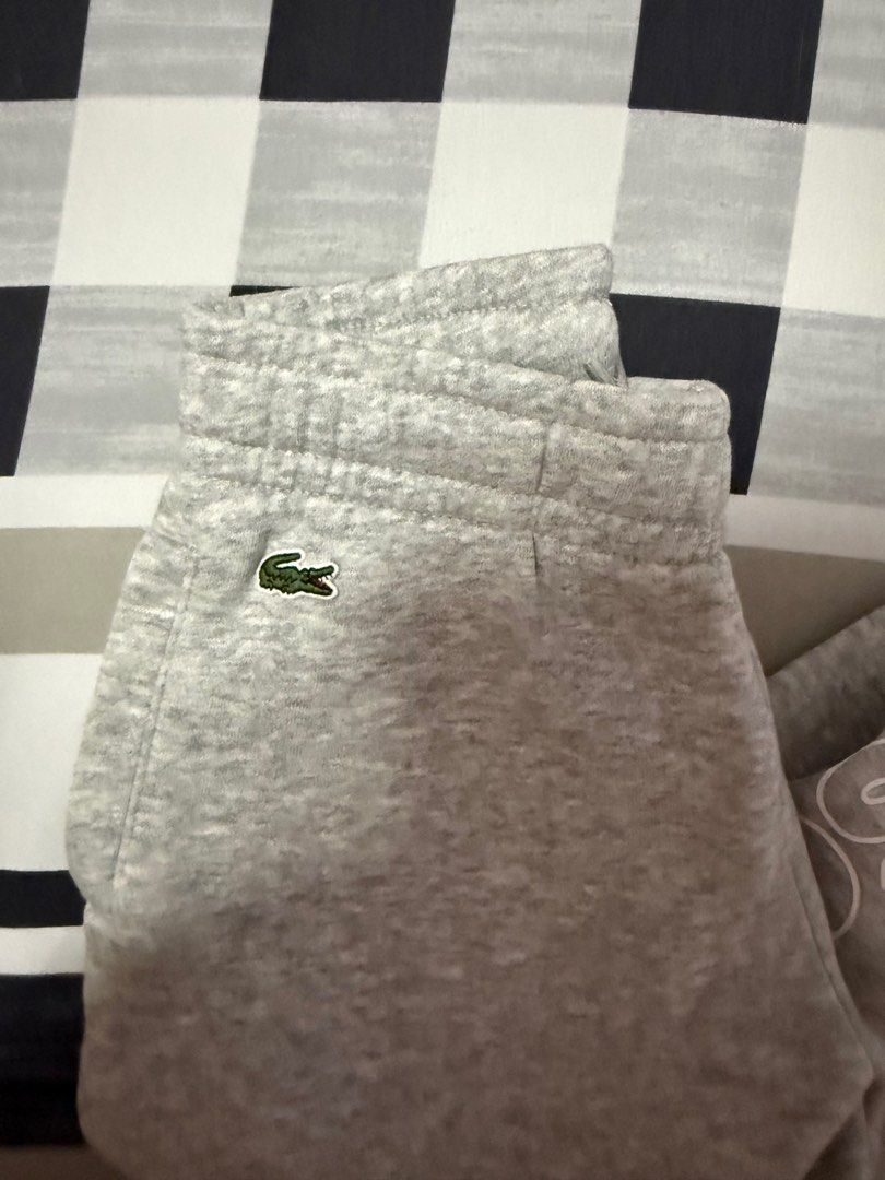 Lacoste Kids Sweatpants Size 4 (Category: Babies & Kids Fashion) located in Naic. Submitted by joancust (Listing ID 1402222634, Image 3). Description: - Lacoste sweatpants for kids - Size: 4 (fits height 104cm / 41 inches) - Features Lacoste logo on leg - Iconic crocodile logo on front - Elastic waistband and cuffs.