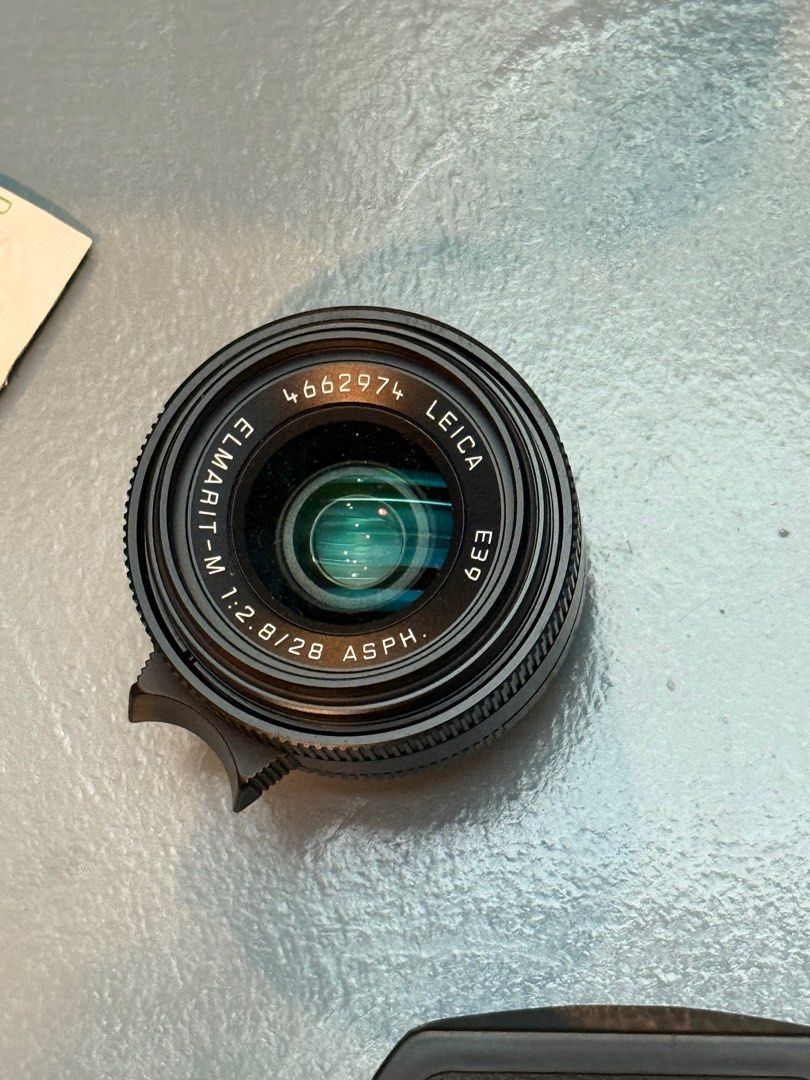 Leica Elmarit-M 2.8/28 ASPH Lens (Category: Cameras) located in Manila. Submitted by cobimoj (Listing ID 1402161885, Image 1). Description: Leica Elmarit-M 28mm 1:2.8/28 ASPH complete with box and certificates Selling for ₱120,000.00 slightly used 9.8/10 (brand new SRP ₱163,000.00).