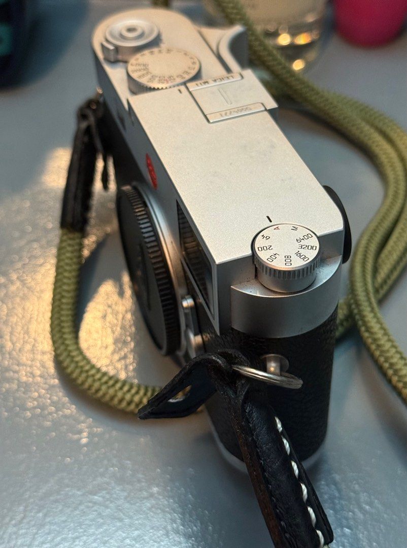 Leica M11 Silver (Body Only) (Category: Cameras) located in Manila. Submitted by cobimoj (Listing ID 1402161397, Image 2). Description: For sale: Leica M11 Silver body only with FREE thumb grip and original Artisan strap (Worth ₱28K) 9.5/10 slightly used Complete with box, certificates and invoice Minor scratches on the battery * gray spots on top are just dirt ₱395,000.00 Rfs: Not using it anymore *Bundle Price ₱513,000 Negotiable. (With Leica E