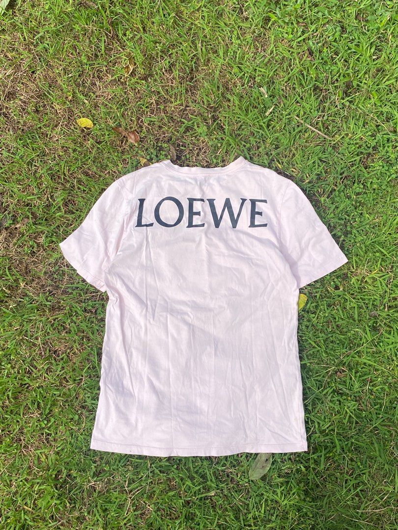 Loewe x Dumbo T-shirt (Category: Tshirts & Polo Shirts ) located in Cavite. Submitted by aintrich (Listing ID 1402224275, Image 1). Description: - Loewe x Disney collaboration - Features a Dumbo graphic - Loewe logo on the back Complete Tags Need Wash.
