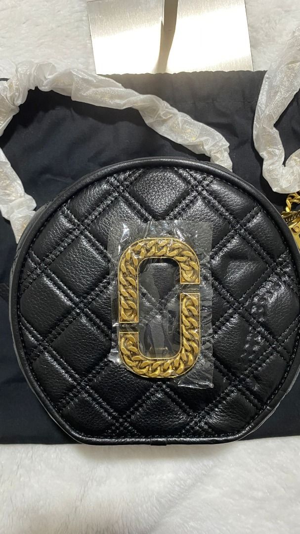Marc Jacobs The Status Round Crossbody Bag (Category: Luxury Bags & Wallets) located in Manila. Submitted by jeanskiecloset (Listing ID 1402283586, Image 3). Description: 100% Authentic Marc Jacobs The Status Round Crossbody Bag Brand New Dimensions and specifications Dimensions: Width: 20cm, Height: 18cm, Depth: 8cm, Strap: 55.5cm.