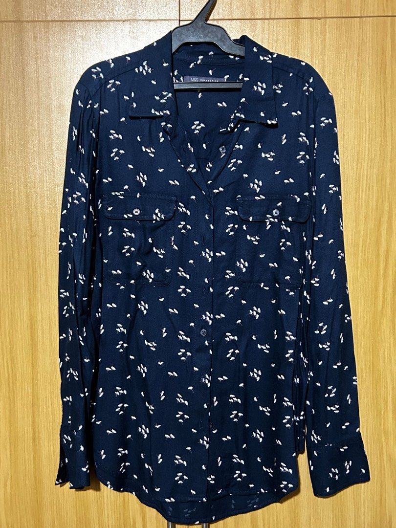 Marks & Spencer Navy Blue Floral Polo - Size Large (Category: Blouses) located in Mabalacat. Submitted by icedoatmatcha (Listing ID 1402209582, Image 1). Description: ‼️ BUY 2 OR MORE FROM MY LISTINGS AND GET FREE SHIPPING selling my mom’s clothes! 👚 Marks & Spencer Navy Blue Floral Polo - Size Large - mop: gcash/bdo - mod: j&t only - loc: pampanga.