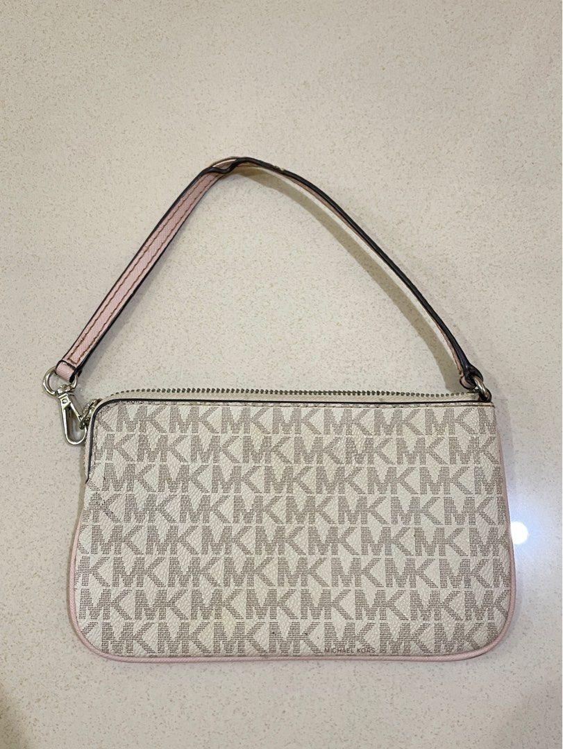 Michael Kors Pink and White Monogram Shoulder Bag (Category: Luxury Bags & Wallets) located in Cagayan de Oro. Submitted by suta.__.ph (Listing ID 1402176254, Image 2). Description: Elegant Michael Kors shoulder bag in light beige monogram print with pink and white center stripe detail. Compact and stylish — perfect for casual or semi-formal looks. • Color: Beige/pink/white • Interior: Clean with MK logo lining and small pocket • Condition: Good 
