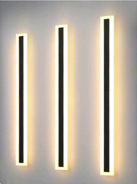 Modern LED Wall Lamp (Category: Lighting) located in Quezon City. Submitted by jofranz89 (Listing ID 1402142480, Image 1). Description: Stylish LED wall lamp perfect for indoor and outdoor use. Features a sleek, rectangular design with a black center and bright, warm lighting. Ideal for hallways, living rooms, or exterior walls. Easy to install and adds a modern touch to any space. Provides ample illumination while saving energy..