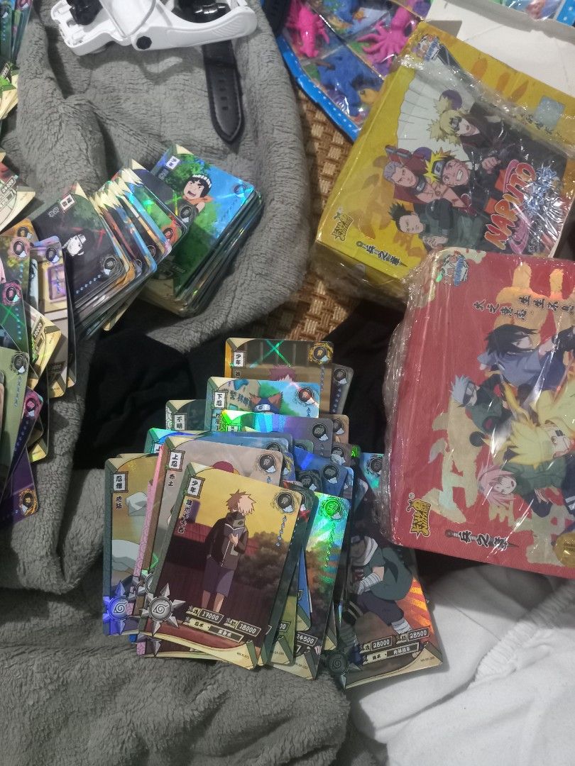 Naruto Trading Cards (Category: Raw Singles) located in Subic. Submitted by regiegabriel29 (Listing ID 1402101829, Image 1). Description: naruto collectible holo cards take all 2 boxes.