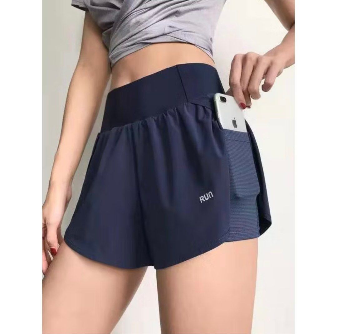 Navy Blue Running Shorts with Pocket (Category: Shorts) located in Quezon City. Submitted by _judebbr1 (Listing ID 1402209333, Image 1). Description: - Navy blue running shorts - Layered design - High waistband - Features a "RUN" logo - Built-in pocket large enough for a phone - Perfect for workouts and casual wear Got this from https://ph.shp.ee/fc3fWM6 for ₱179 Blue only, size M..