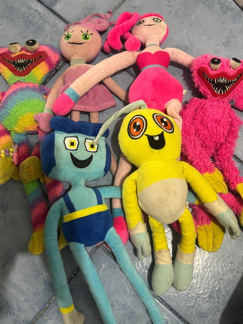 Poppy Playtime Plush Toys (Category: Plushies & Soft Toys) located in Quezon City. Submitted by lrshoppe (Listing ID 1402163797, Image 2). Description: FOR TAKE ALL!! - Poppy Playtime plush toy collection. - Features characters like Huggy Wuggy and Mommy Long Legs. - Vibrant colors and detailed designs. - Perfect for fans of the game. - Great for plush toy collectors..