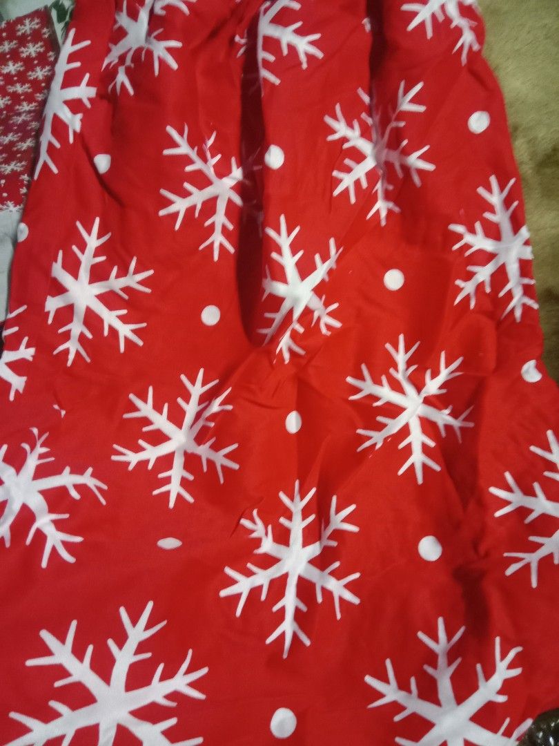 Red Snowflake Christmas Chair Cover (Category: Chairs) located in Rizal. Submitted by marmmgasm (Listing ID 1402283135, Image 3). Description: - Brand new christmas chair cover - Features a festive red background with white snowflake patterns - Designed to fit standard chairs - Adds holiday cheer to your dining room or kitchen - Still in original packaging.